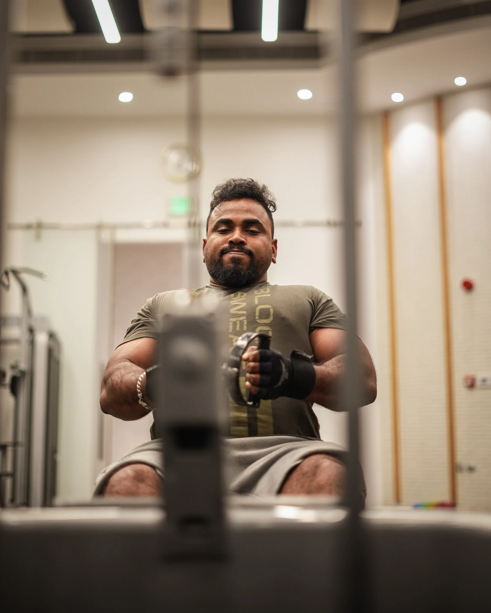 Young athlete doing a strength and conditioning exercise in the gym